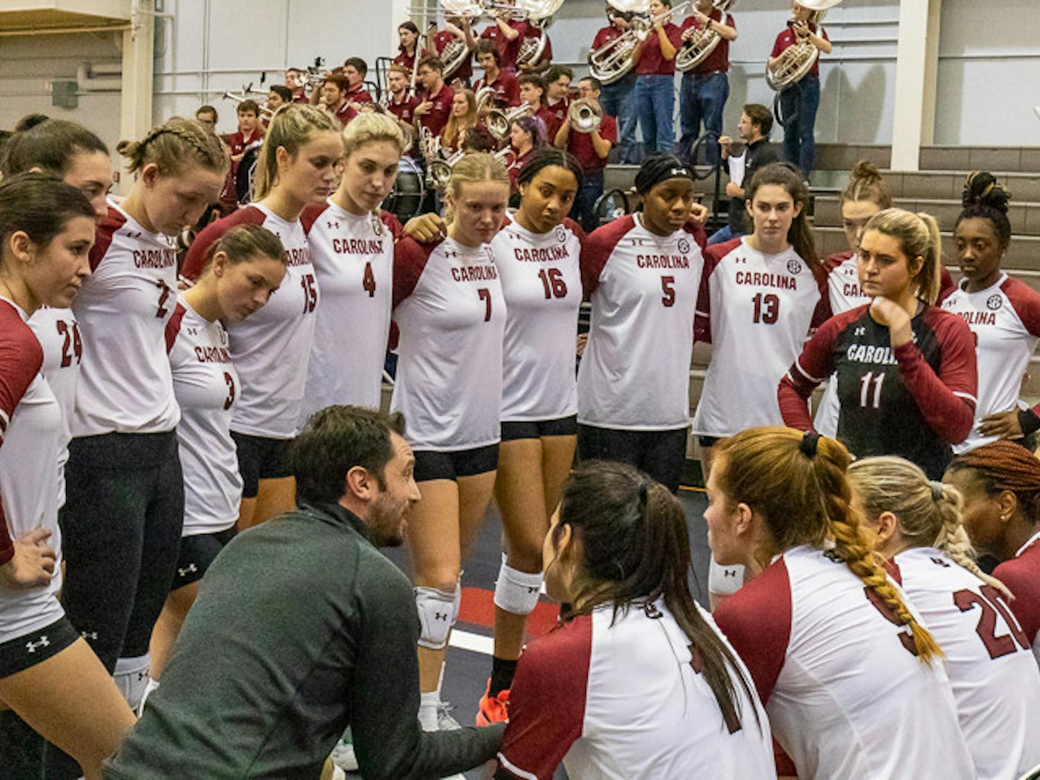 Head coach Tom Mendoza speaks to the South Carolina volleyball team during a timeout at the matchup against Ole Miss on Nov. 5, 2022. Ole Miss beat the Gamecocks 3-1.