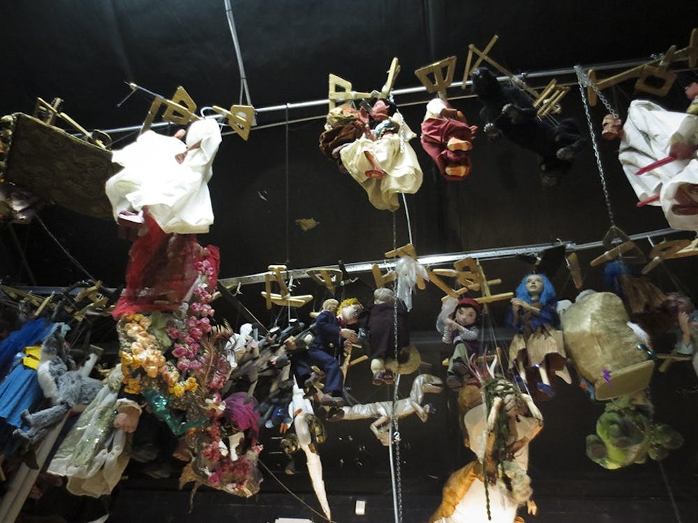 <p>Different types of puppets hang in the Columbia Marionette Theatre. All puppets for the <strong>theater</strong> are created in-house.</p>