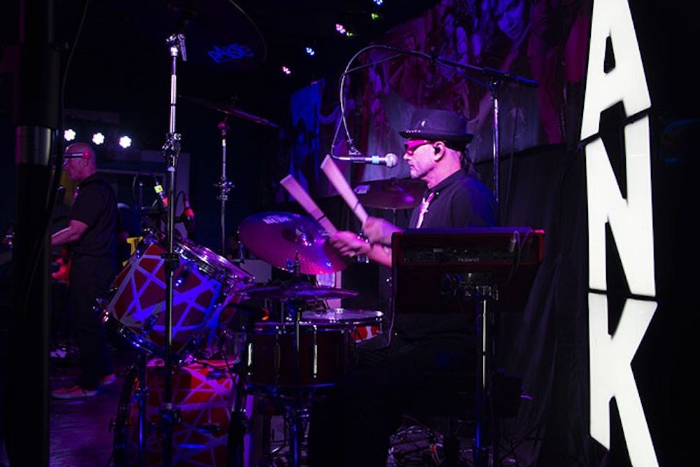 <p>Drummer and vocalist Chris Simmons plays the drums while performing at Breakers Nov. 14, 2019. When in Columbia, South Carolina, Spank! The 80s plays for bars and Greek life events.</p>