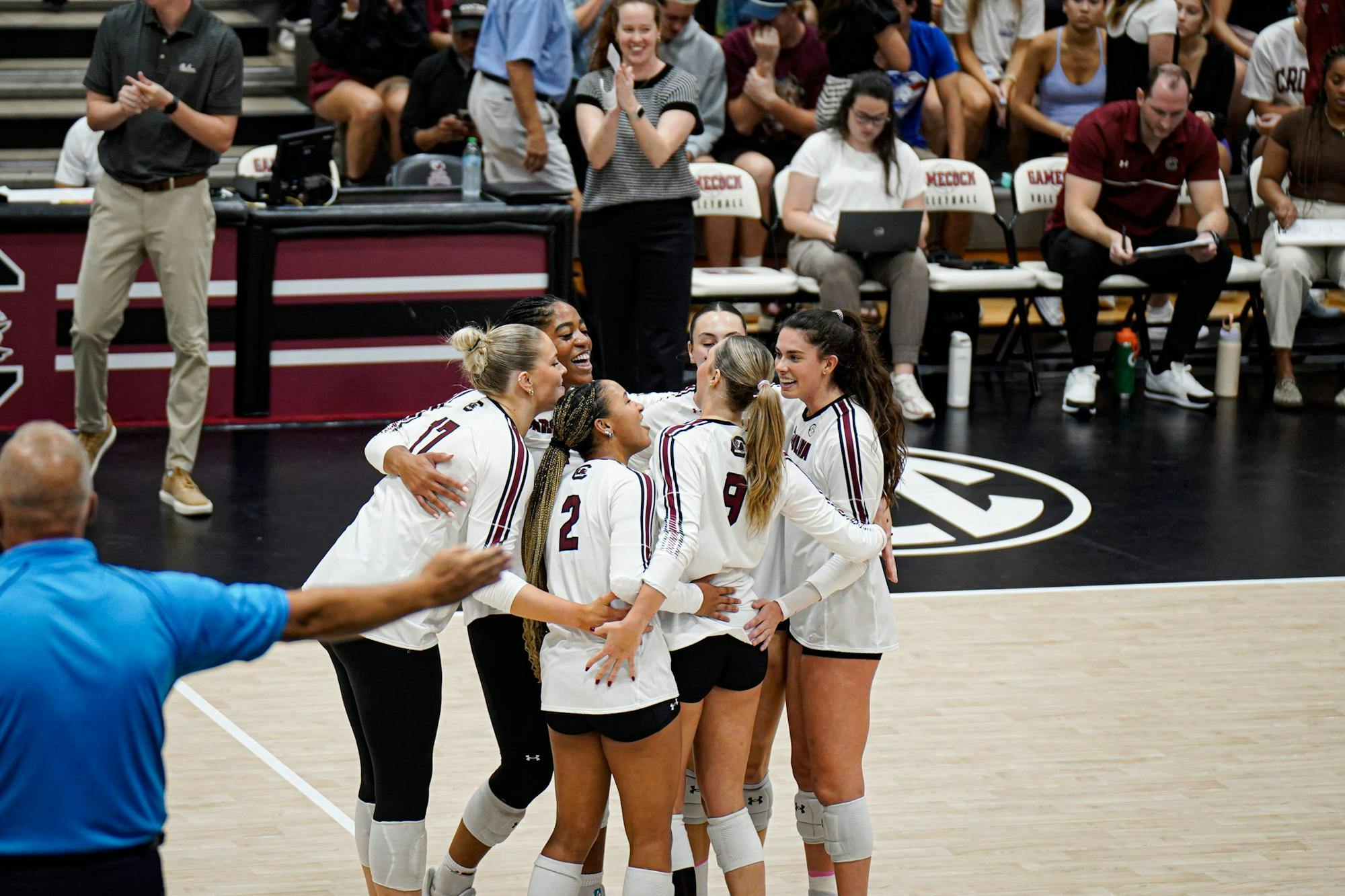 The Gamecock volleyball team celebrates after a kill by junior middle Ava Leahy against Alabama at the Carolina Volleyball Center on Oct. 19, 2025. Leahy had 6 kills this game.