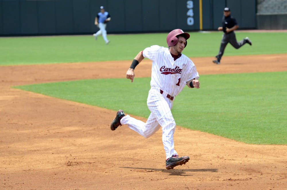 Third baseman Chase Vergason rounds the bases.