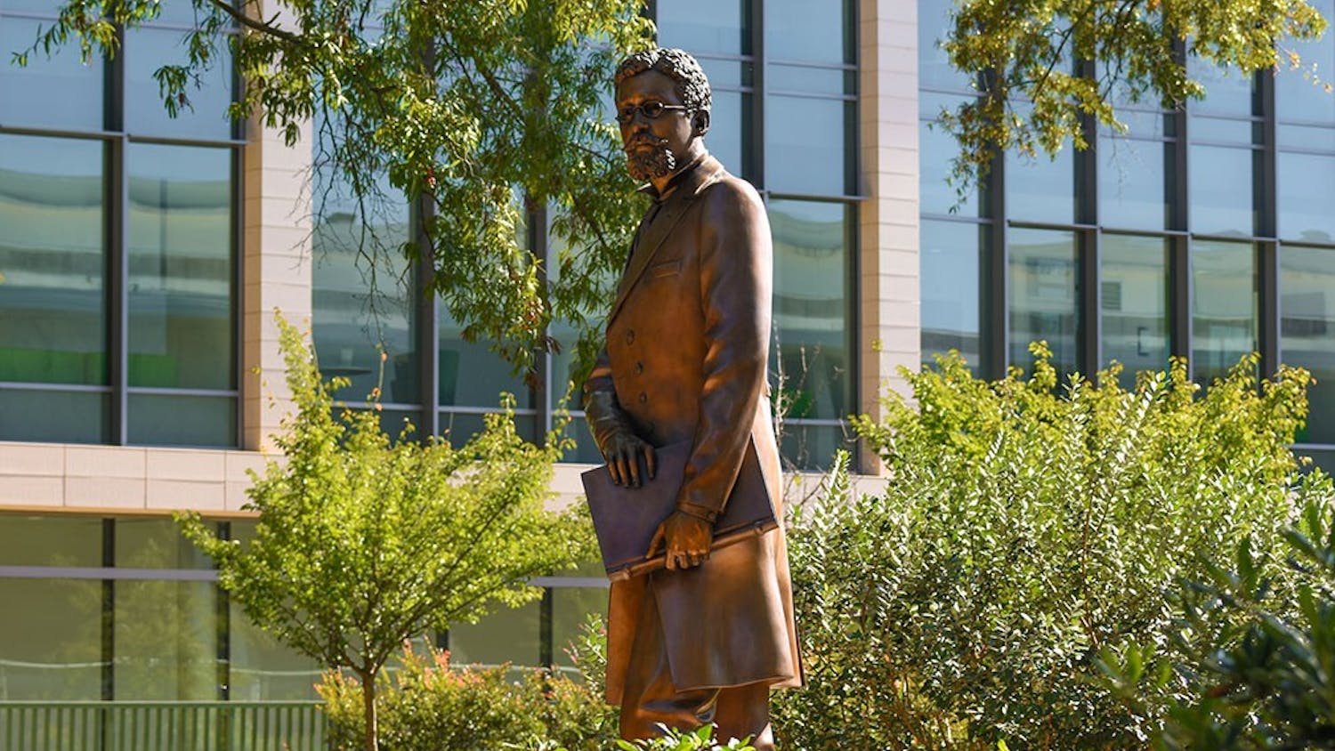 The Richard T. Greener memorial created by John Hair in 2013, situated outside of the Thomas Cooper Library. The statue commemorates Greener, who was the university's first Black professor and a lawyer, scholar, librarian and activist.&nbsp;