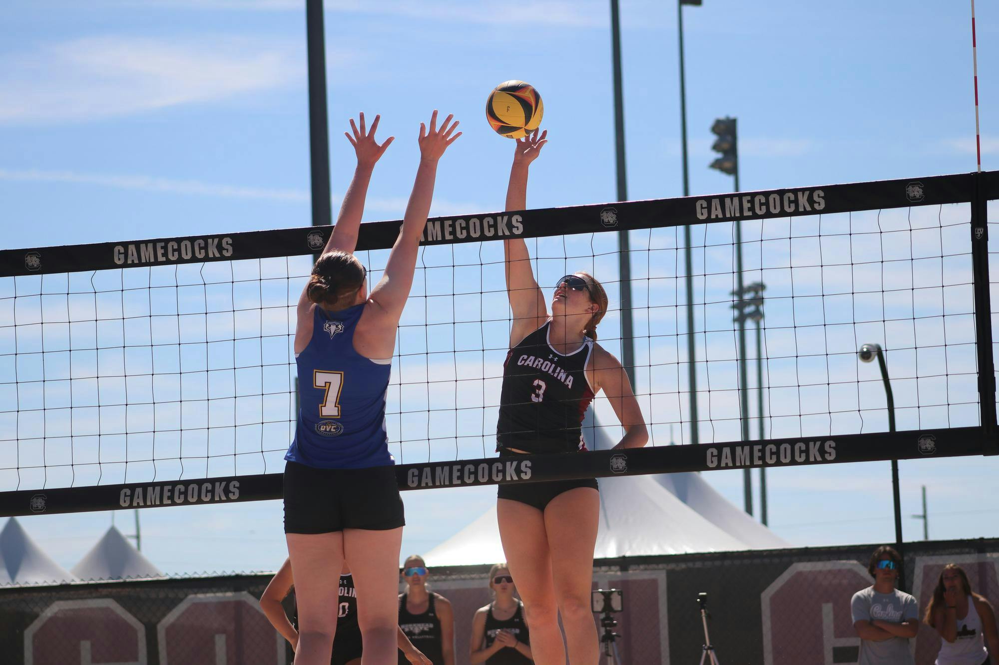 Freshman Abigail Lagemann blocks a serve against the opposing team, Morehead State, at Wheeler Beach on April 7, 2024. The Gamecocks stand at 15-9 overall and have the second-most home wins in a single season in program history with 11.