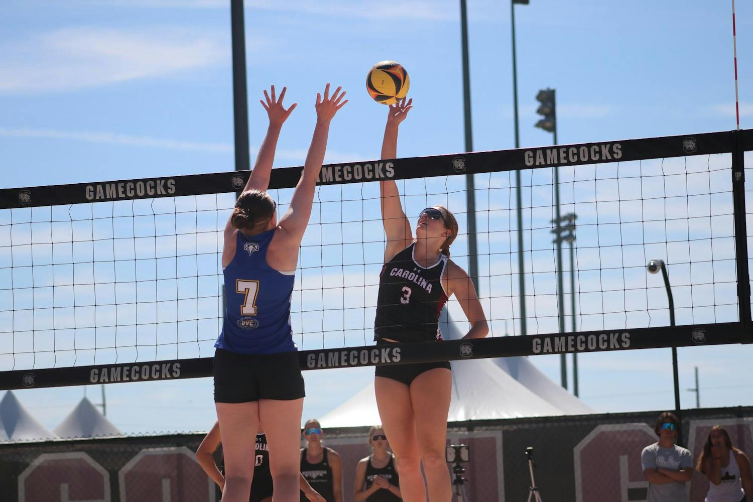Freshman Abigail Lagemann blocks a serve against the opposing team, Morehead State, at Wheeler Beach on April 7, 2024. The Gamecocks stand at 15-9 overall and have the second-most home wins in a single 鶹С򽴫ý in program history with 11.