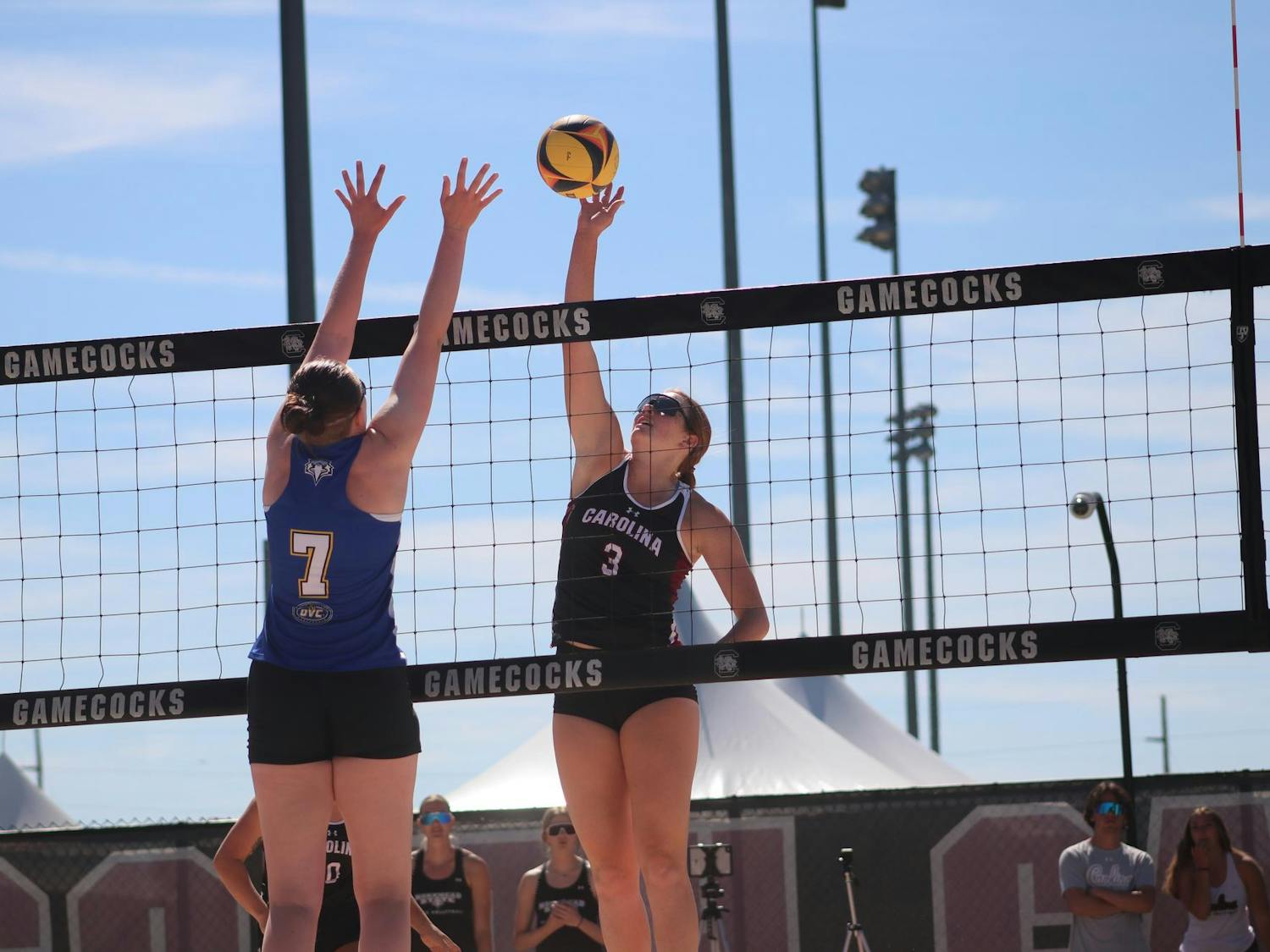 Freshman Abigail Lagemann blocks a serve against the opposing team, Morehead State, at Wheeler Beach on April 7, 2024. The Gamecocks stand at 15-9 overall and have the second-most home wins in a single season in program history with 11.