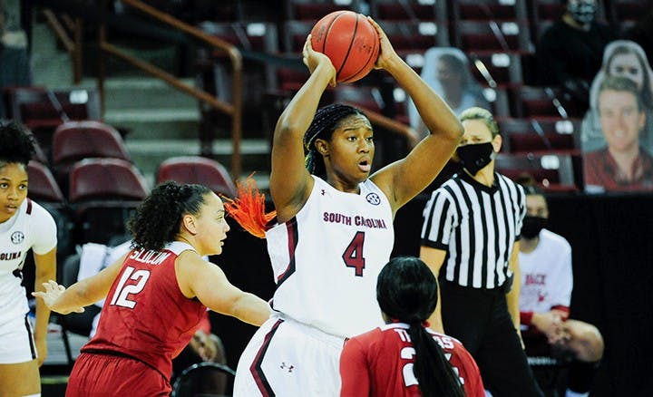 Sophomore forward Aliyah Boston looks to make a pass in South Carolina's Monday win over Arkansas. The Gamecocks beat the Razorbacks 104-82.