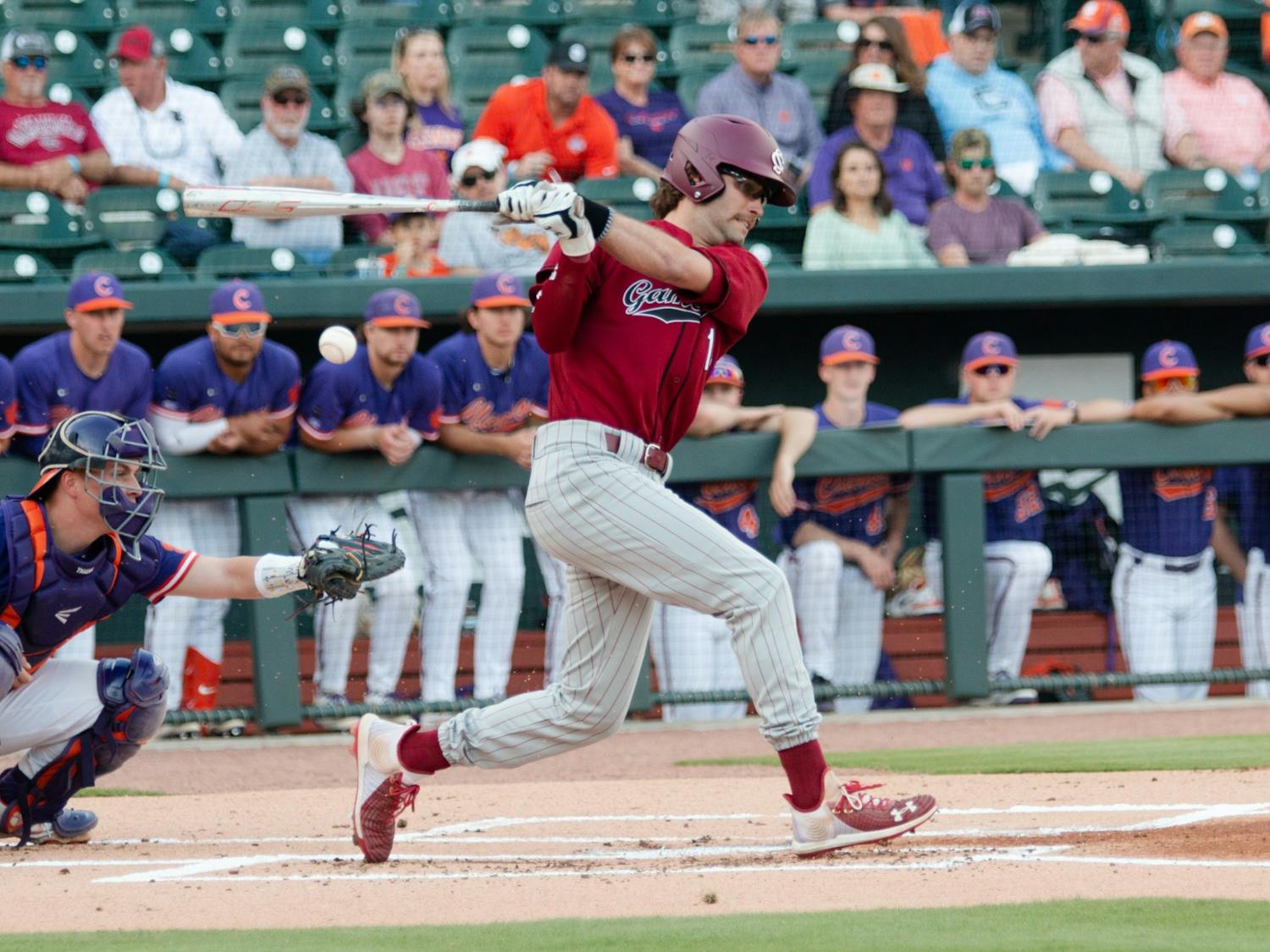 FILE—Fifth-year outfielder Brandt Belk swings and runs a single during a game on March 5, 2022. The Gamecocks fell 10-2 in the second game of the series against Clemson.
