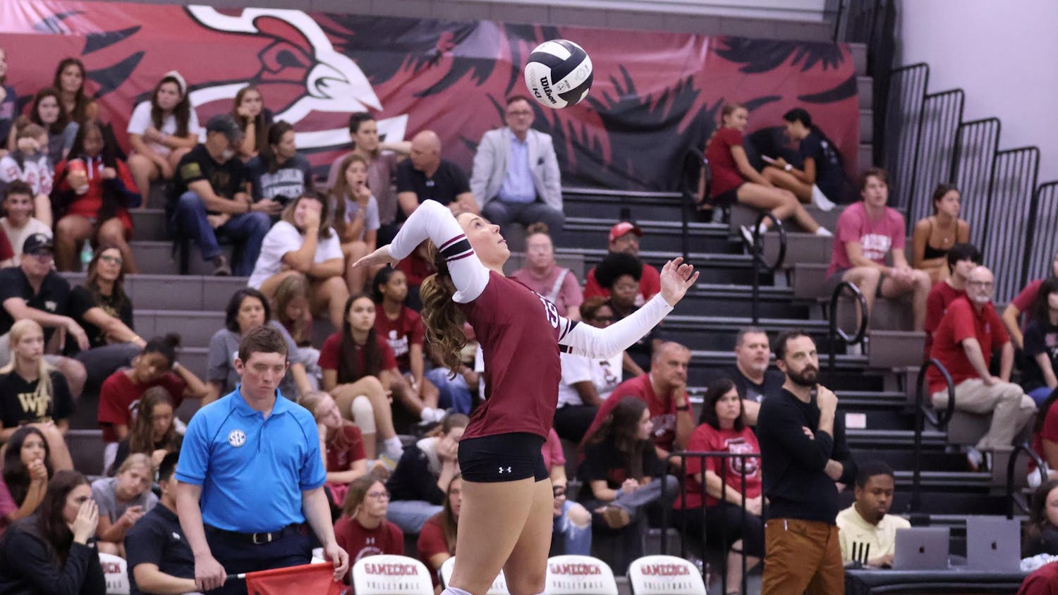 FILE — Sophomore defensive specialist Elizabeth McElveen serves the ball during a game against Wake Forest on Sept. 15, 2024 at the Carolina Volleyball Center.
