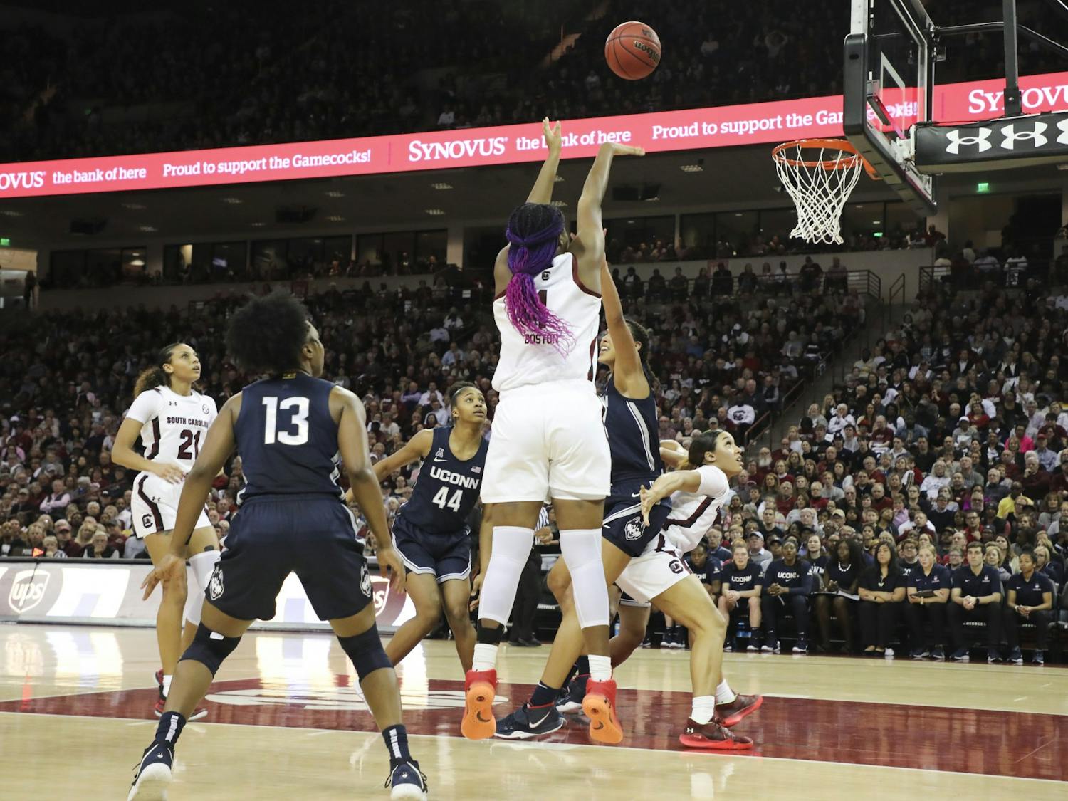 Freshman forward Aliyah Boston attempts to make a basket. Boston scored 13 points, 12 rebounds and one assist against UConn.