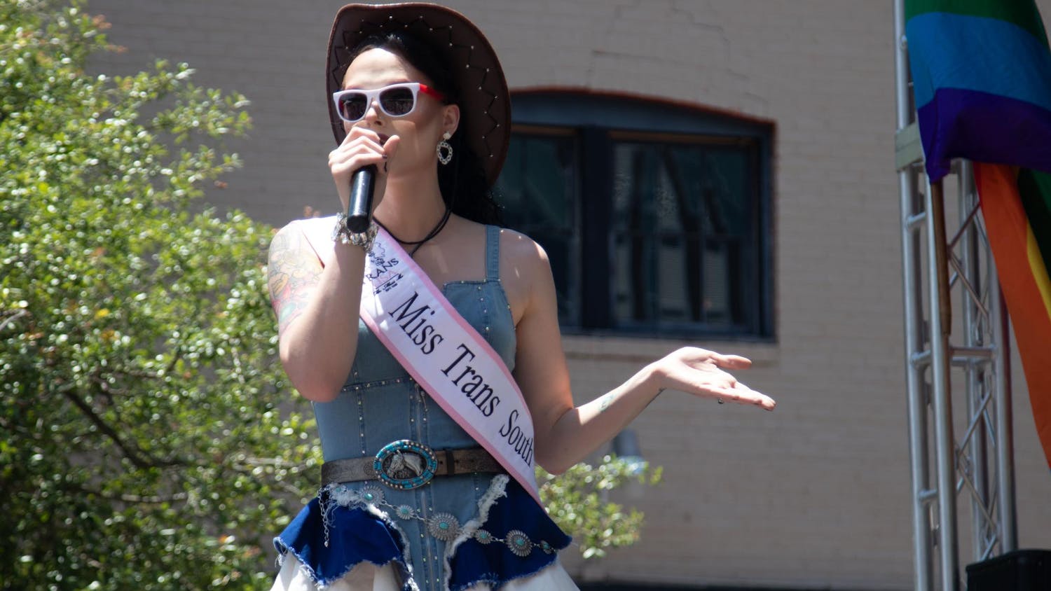 KoKo Dove, Miss Trans South Carolina, hosting the drag competition at Outfest on June 1, 2024. Outfest celebrates the LGBTQIA+ community's strength and spirit, featuring local talent and businesses during Pride Month.