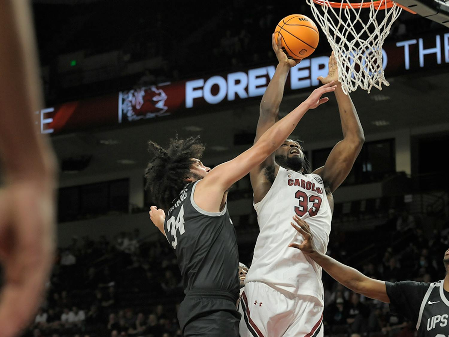 Sophomore forward Josh Gray puts the ball in the basket in the first half against the USC Upstate Spartans. The Gamecocks won 78-60 against USC Upstate.