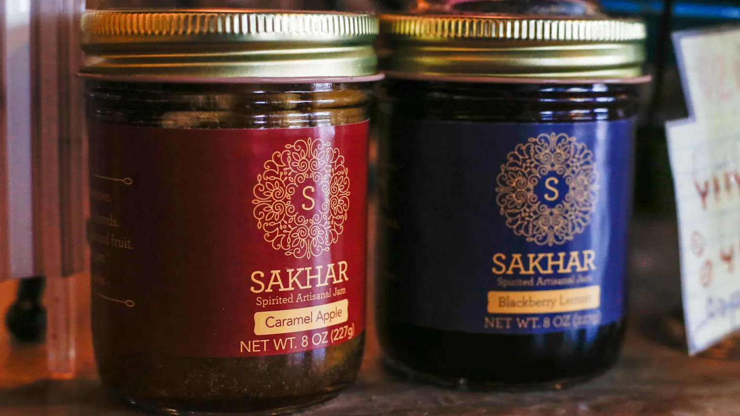 Two jars of Sahkar Spirited Artisanal Jam are displayed on the counter of Drip Coffee located at 729 Saluda Avenue in the Five Points area of Columbia, S.C. Drip is one of a number of local business that sell or utilize Sahkar products in their menu.