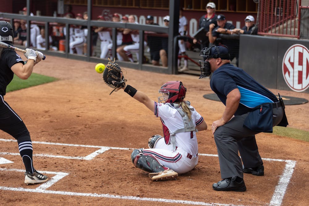 <p>Sophomore catcher Giulia Desiderio holds her mitt up in the air, preparing the catch the ball. The Gamecocks played the Aggies at Beckham Field on April 16, 2023, winning the game 8-0 to sweep the series.&nbsp;</p>