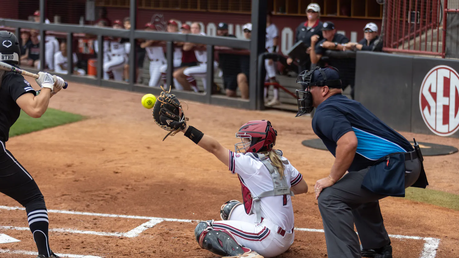 Sophomore catcher Giulia Desiderio holds her mitt up in the air, preparing the catch the ball. The Gamecocks played the Aggies at Beckham Field on April 16, 2023, winning the game 8-0 to sweep the series. 
