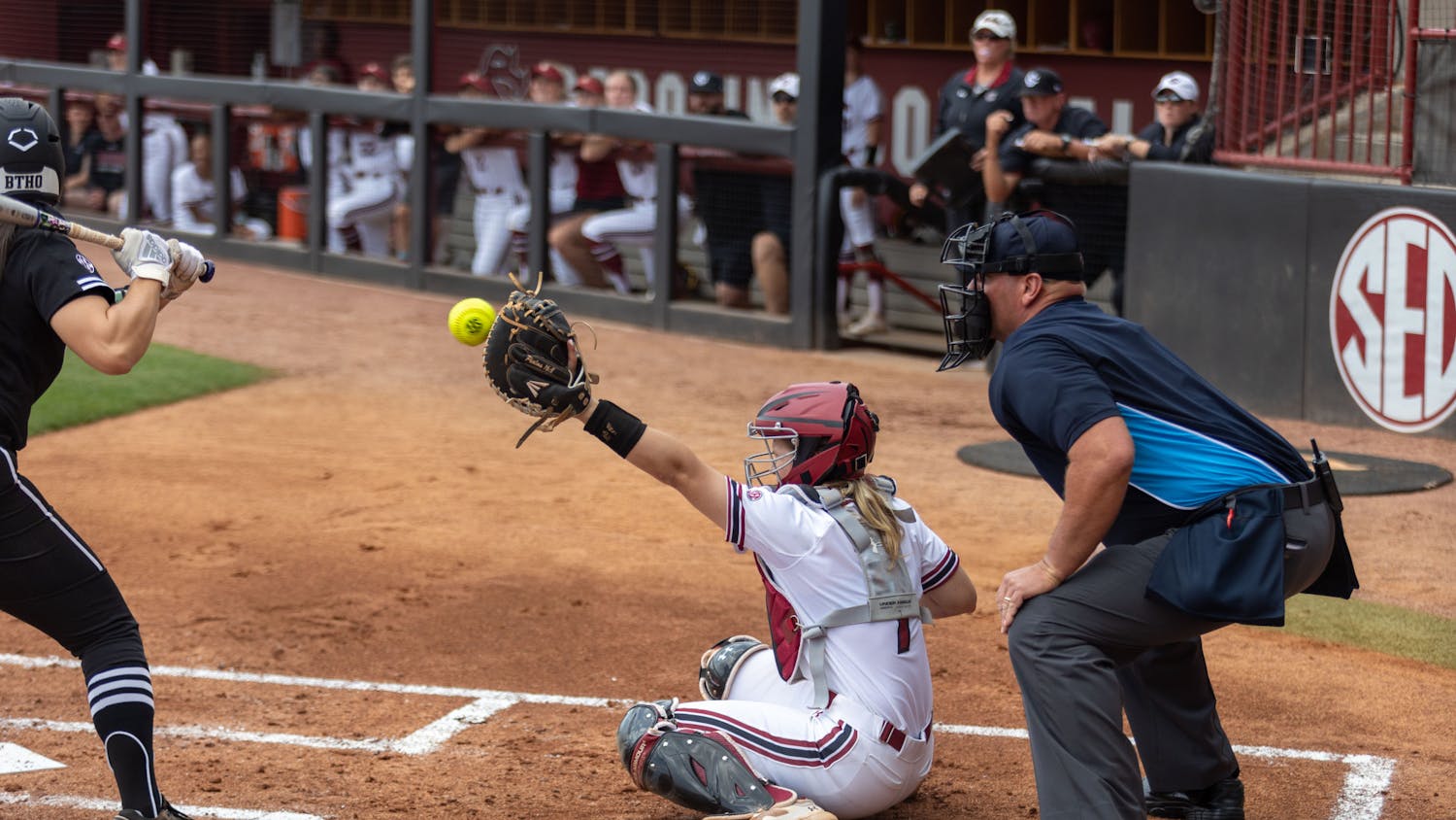 Sophomore catcher Giulia Desiderio holds her mitt up in the air, preparing the catch the ball. The Gamecocks played the Aggies at Beckham Field on April 16, 2023, winning the game 8-0 to sweep the series.&nbsp;