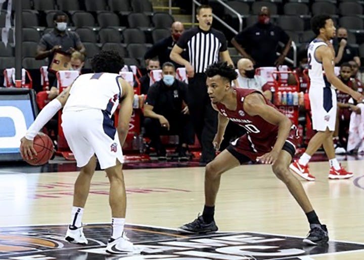 Junior guard AJ Lawson faces a Liberty player during the game. The Liberty Flames defeated the Gamecocks 78-62.