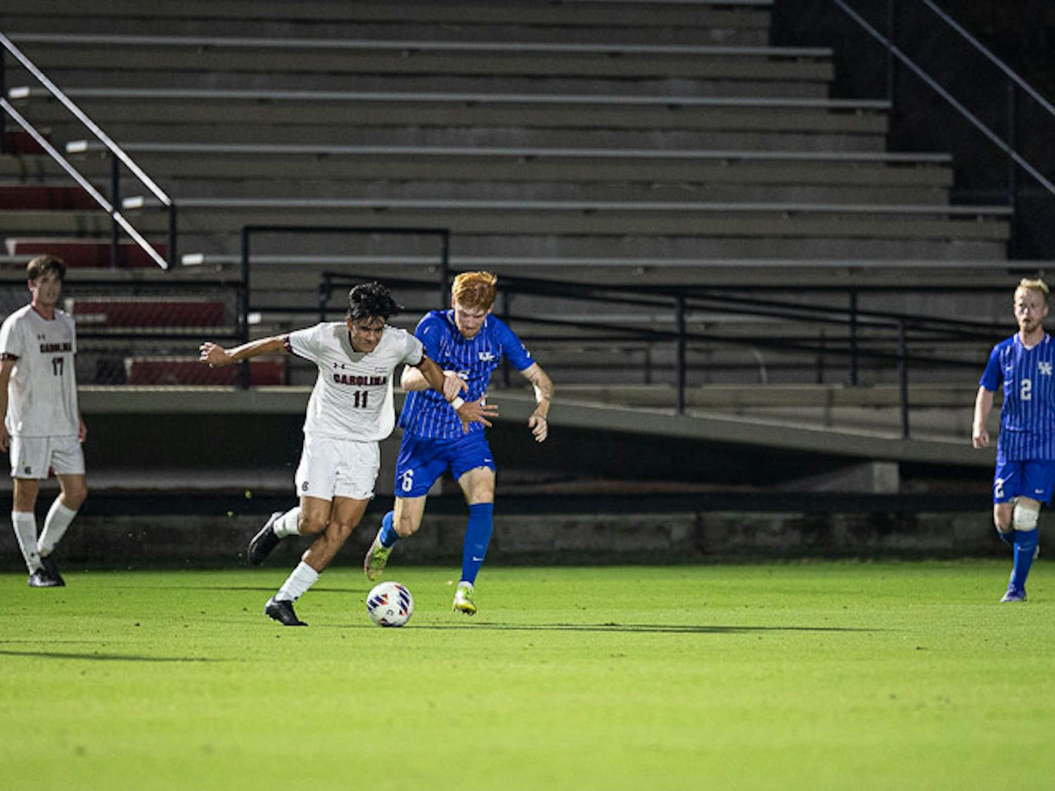 Freshman midfielder Rocky Perez attempts to steal the ball from a Kentucky midfielder during the Gamecocks matchup with the Wildcats on Nov. 1, 2022. Kentucky beat South Carolina 3-0.
