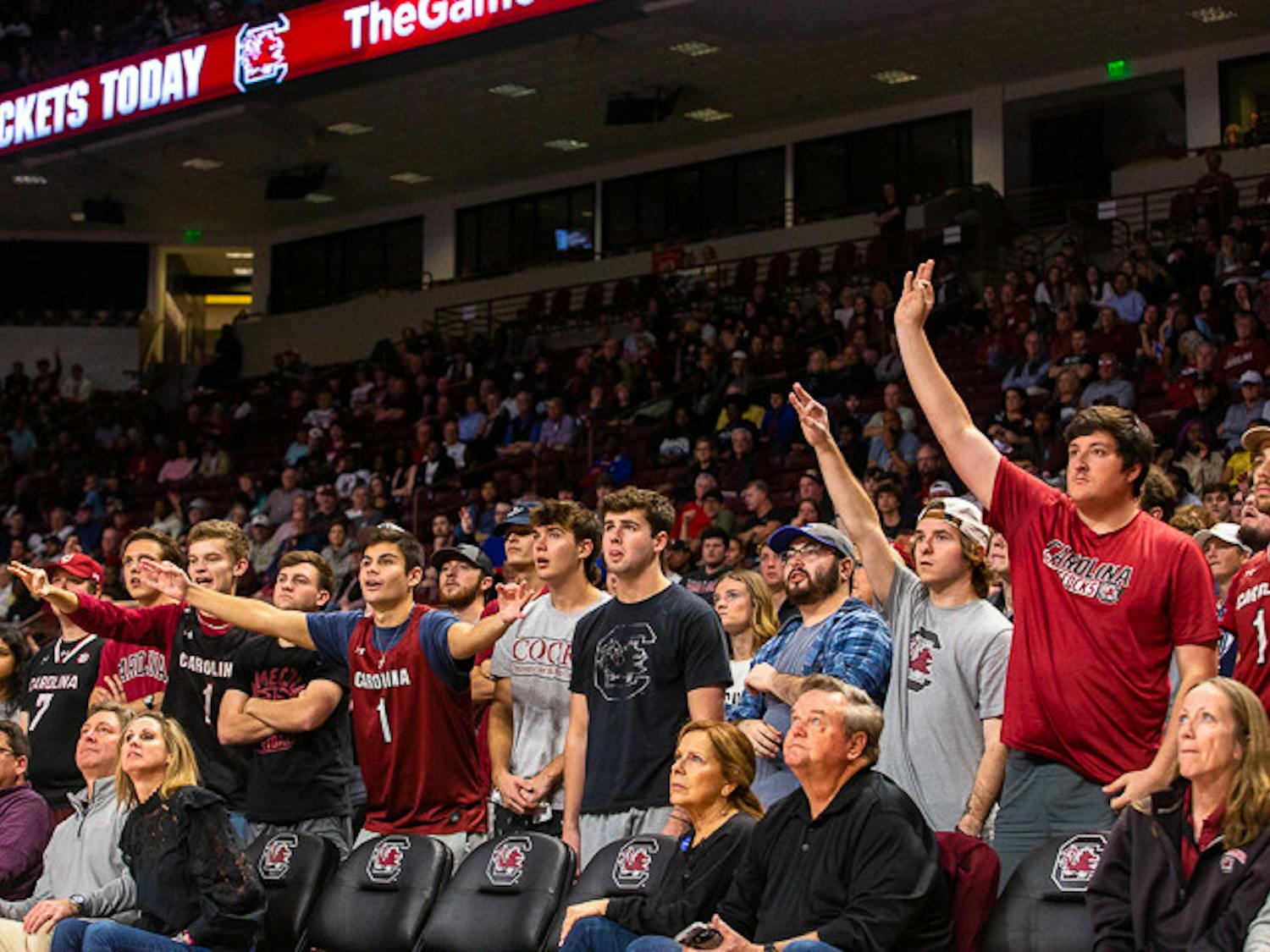 The South Carolina student section and fellow fans are caught in awe as a ball flies through the air towards the basket. The Gamecock’s season opener resulted in them defeating S.C. State 80-77 on Nov. 8, 2022.