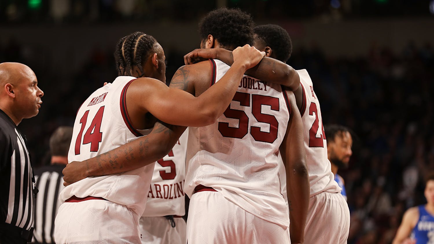 FILE— The Gamecocks take a huddle during a game against the Kentucky Wildcats on Feb. 8, 2022.