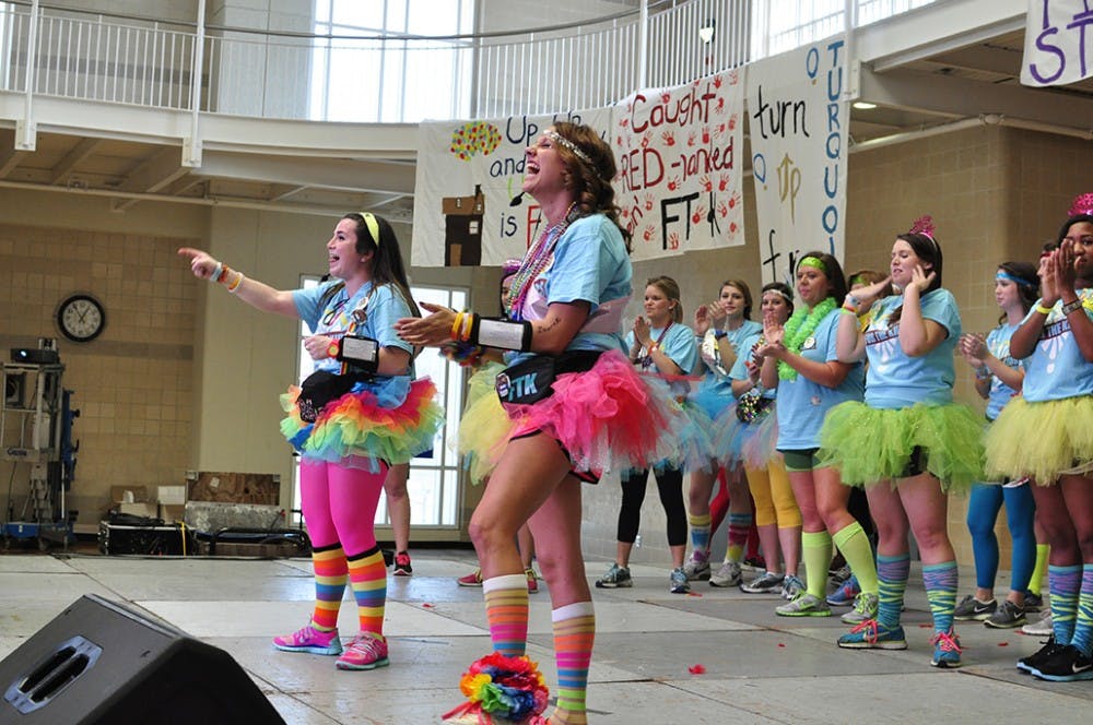 	Head morale leaders Lauren Carpenter and Katelyn Daley get the crowd of dancers excited for the next 24 hours.
Brian Almond/The Daily Gamecock