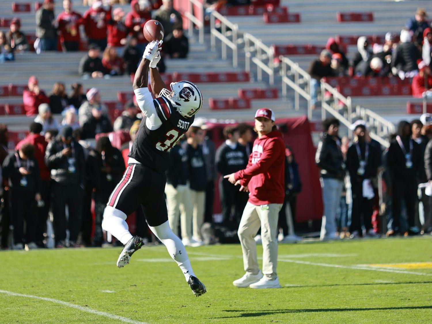 Freshman defensive back Chris Hatfield leaps to catch a pass during warmups before USC’s matchup against Clemson on Nov. 29, 2025, at Williams-Brice Stadium. Hatfield participates in pregame drills as the Gamecocks prepare to take the field for the rivalry game.