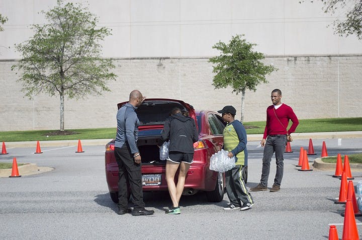 Bottled water is distributed from the Columbia Convention Center on October 6. 