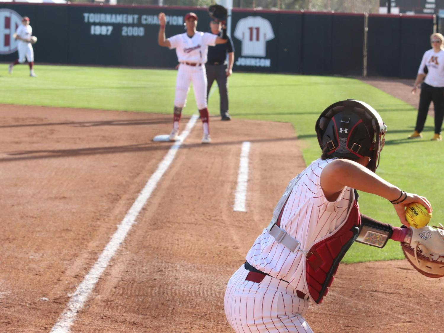 Senior catcher Jen Cummings throws to first base in South Carolina's game against Minnesota on March 16, 2024. Cummings has 131 putouts on the season. 