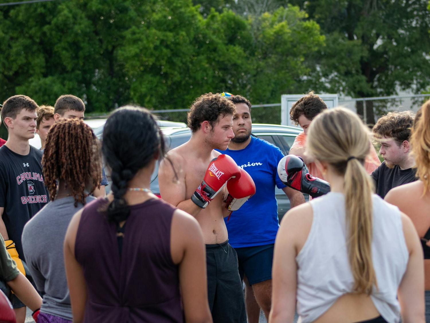 USC's Carolina Boxing Club gathers for an high-paced practice session on Sept. 12, 2022, at Battle Boxing Gym on Bluff Rd. in Columbia, S.C. The Carolina Boxing Club practices Monday, Wednesday and Friday afternoons for a variety of training sessions to prepare members for live-sparring sessions and tournaments taking place later this season.