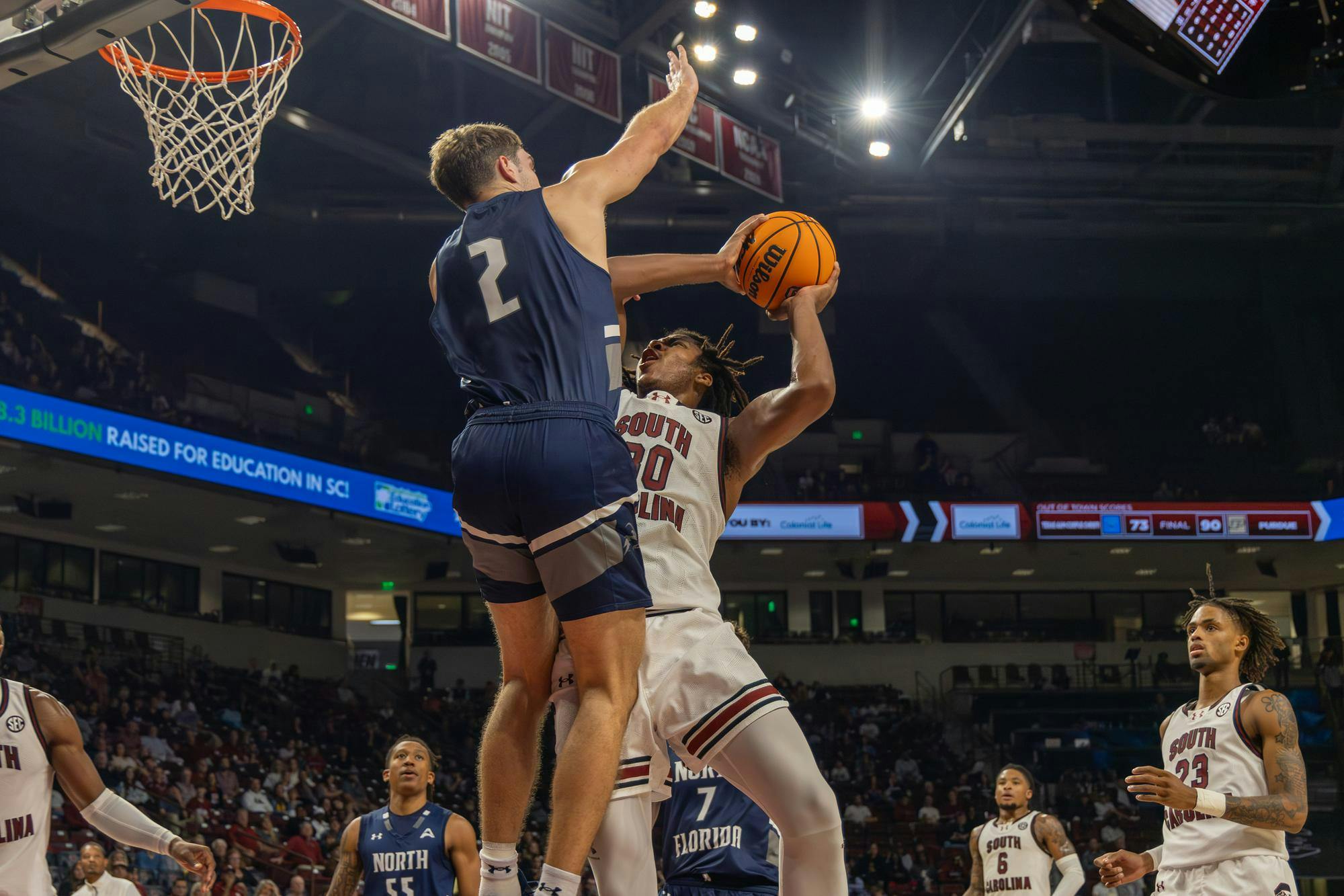 A University of North Florida guard blocks sophomore forward Collin Murray-Boyles from scoring during South Carolina's season opener on Nov. 4, 2024 at Colonial Life Arena. The Gamecocks lost to the Ospreys 71-74 after leading for 28 minutes of the game.