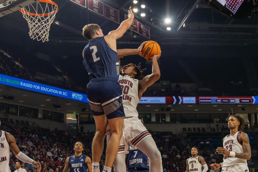 <p>A University of North Florida guard blocks sophomore forward Collin Murray-Boyles from scoring during South Carolina's season opener on Nov. 4, 2024 at Colonial Life Arena. The Gamecocks lost to the Ospreys 71-74 after leading for 28 minutes of the game.</p>