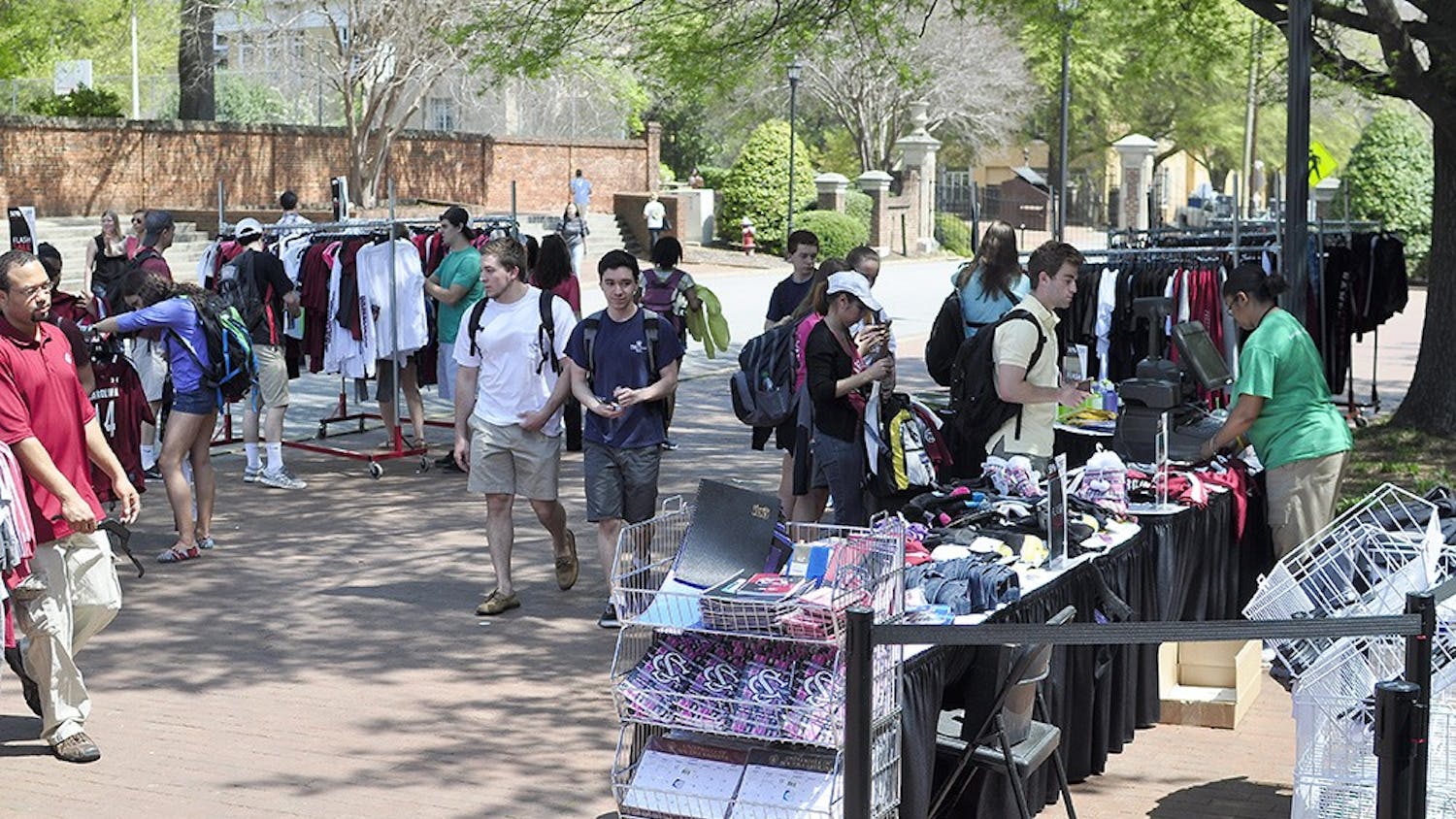 	Members of the USC Fashion Board sell T-shirts and hair ties designed by students, as well as tickets to Thursday’s fashion show on Greene Street Monday.