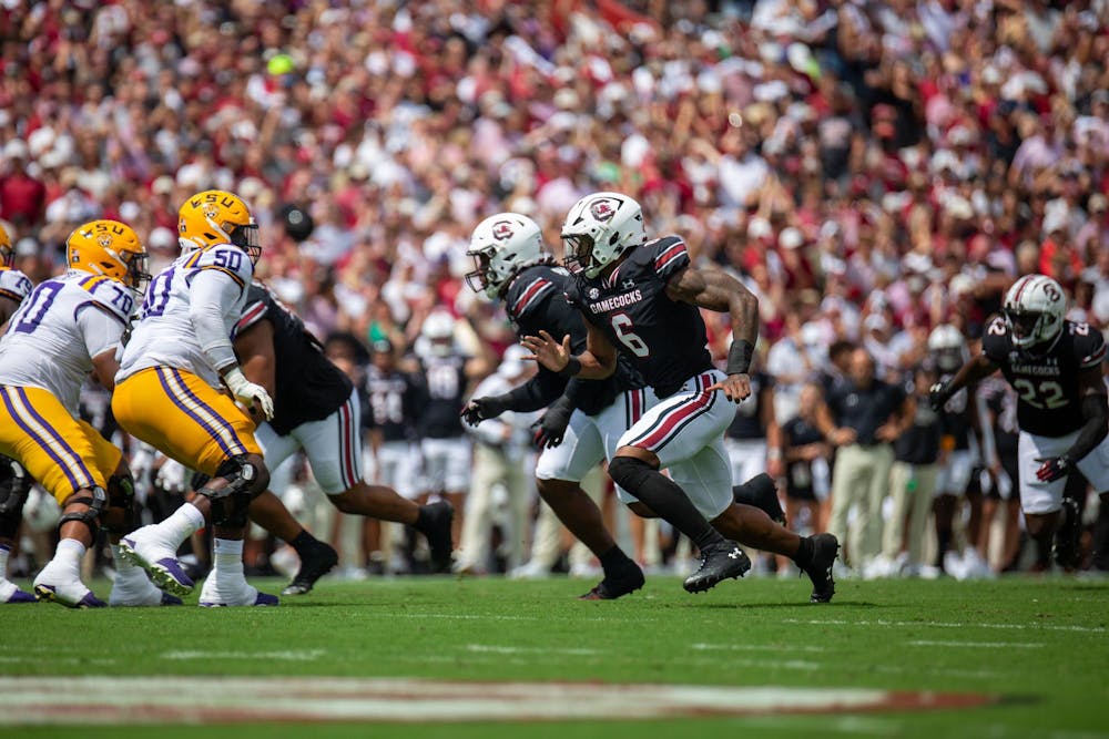 <p>FILE — Freshman edge Dylan Stewart rushes the LSU offensive line on Sept. 14, 2024 at Williams-Brice Stadium. Stewart has helped in the growth of the Gamecock defense.</p>