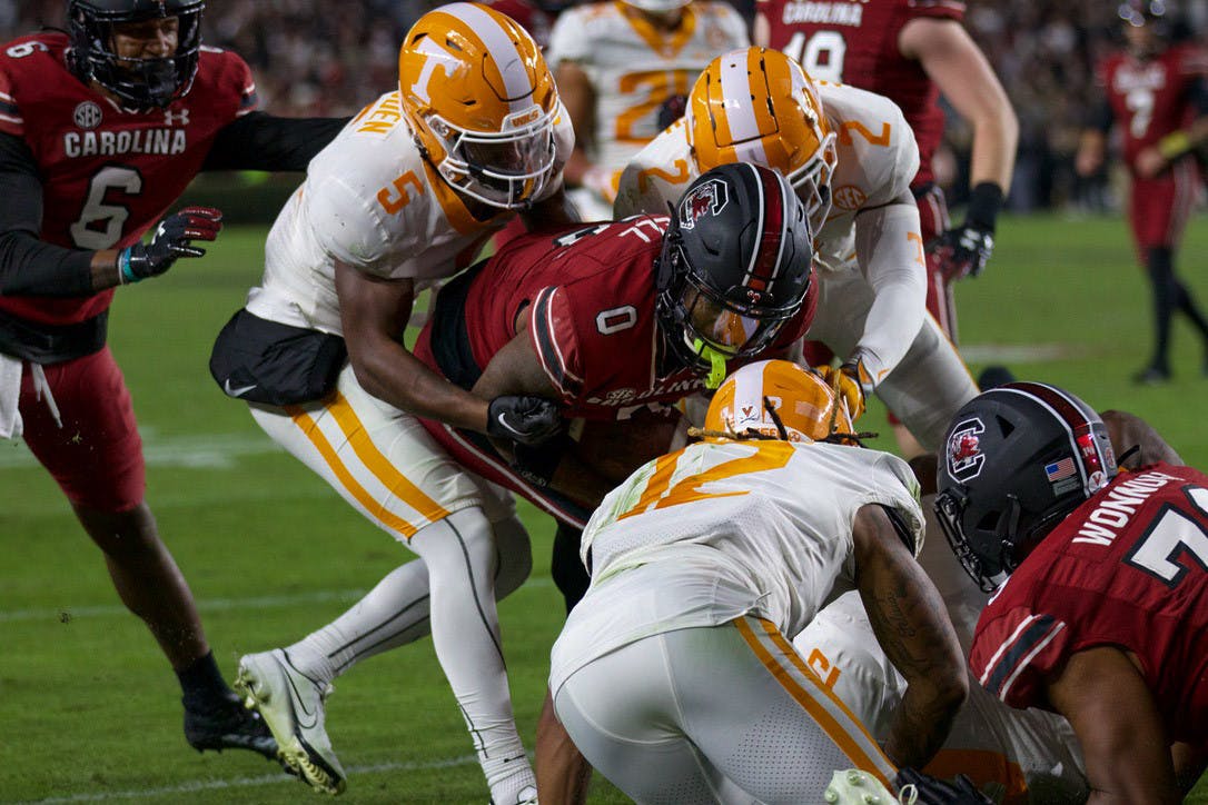 Junior tight end Jaheim Bell dives into the end zone while being held back by the Tennessee defense, this play put the Gamecocks up 49-31. South Carolina beat Tennessee 63-38 largely due to impressive plays like this one in the team's last home game of the season on Nov. 19, 2022.