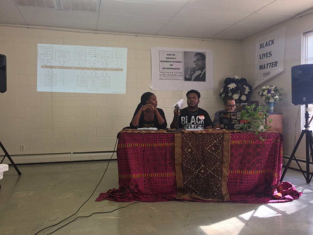 <p>Saadiqa Kumanyika, left, serves as a panelist to speak about the "Planks of Vision for Black Lives" at a Greenville teach-in&nbsp;on Saturday, Sept. 24.</p>
