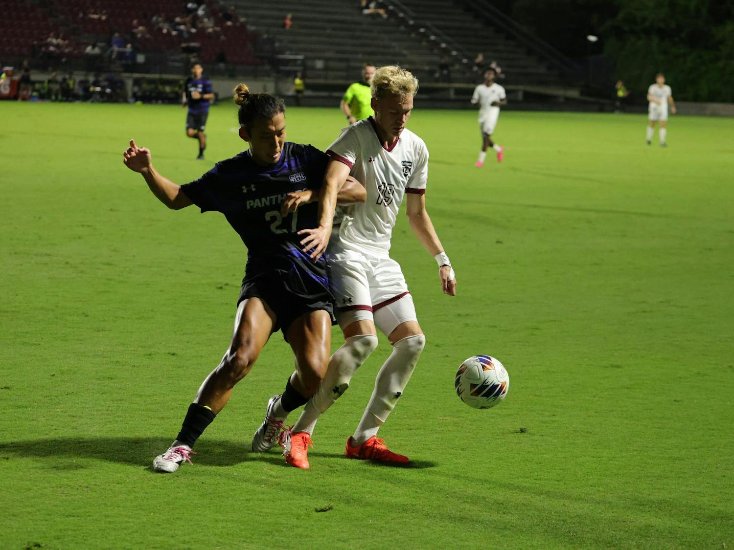 Junior forward Keanan Bader fights off a Georgia State defender to keep possession during South Carolina’s match at Eugene E. Stone Stadium on Friday, Sept. 19, 2025.