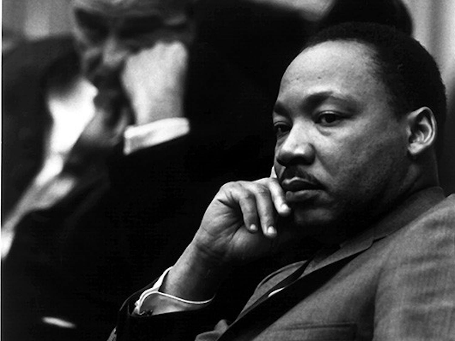 KRT US NEWS STORY SLUGGED: MEMORIES KRT PHOTOGRAPH BY YOICHI OKAMOTO COURTESY OF THE NATIONAL ARCHIVES (KRT120 - March 4) "Rev. Martin Luther King Jr.; President Lyndon Johnson in background," taken by Yoichi Okamoto on March 18, 1966, is one of 180 photographs on display in the exhibit "Picturing the Century: One Hundred Years of Photography" on display from March 12, 1999 through July 4, 2001 at the National Archives Exhibition Hall in Washington, DC. (KRT) PL KD (B&W ONLY) 1999 (Vert)