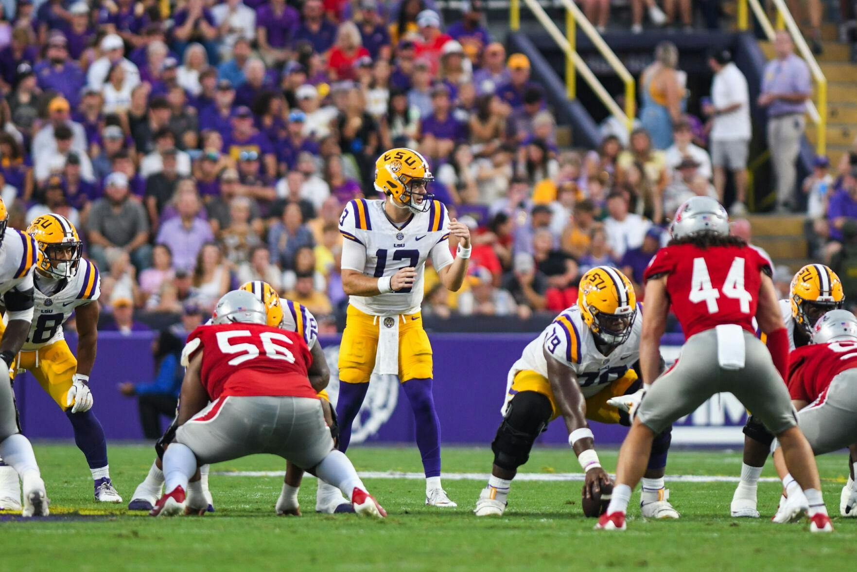 LSU junior quarterback Garrett Nussmeier (13) prepares to take the snap on Saturday, Sept. 7, 2024, during the game against Nicholls at Tiger Stadium in Baton Rouge, Louisiana. The Tigers will travel to Columbia on Sept. 14, 2024, to take on The Gamecocks at Williams-Brice Stadium.