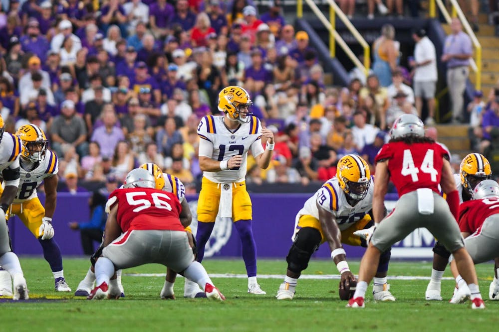 <p>LSU junior quarterback Garrett Nussmeier (13) prepares to take the snap on Saturday, Sept. 7, 2024, during the game against Nicholls at Tiger Stadium in Baton Rouge, Louisiana. The Tigers will travel to Columbia on Sept. 14, 2024, to take on The Gamecocks at Williams-Brice Stadium.</p>