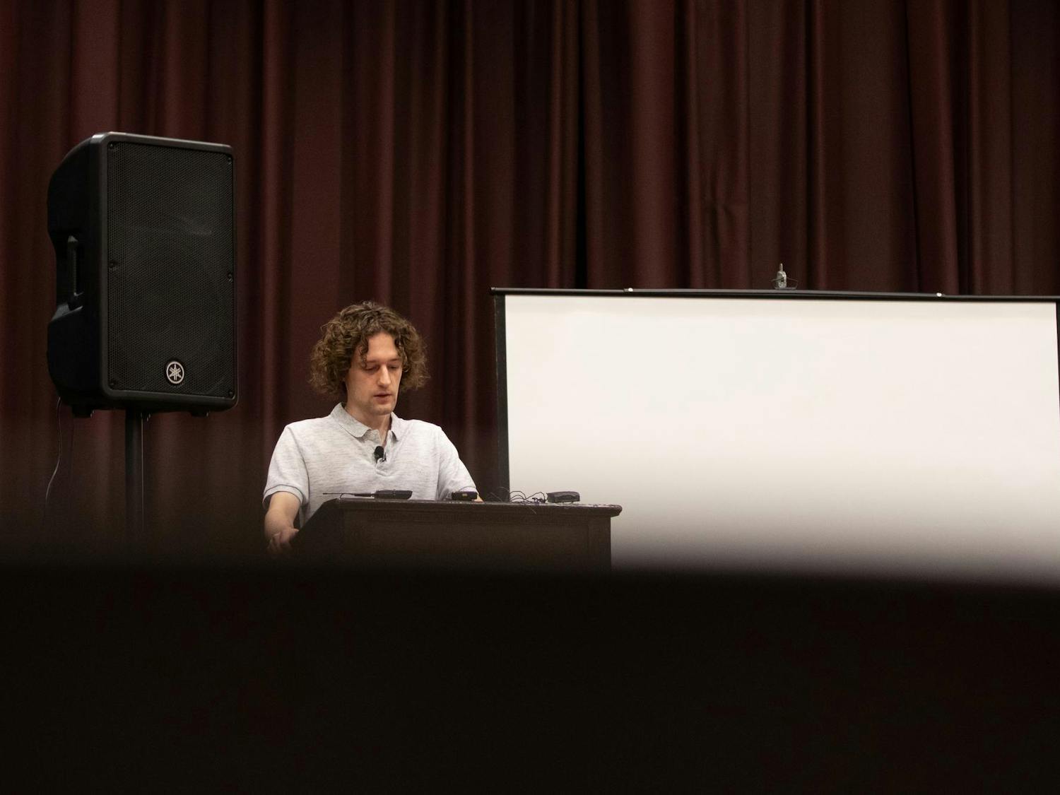 FILE - Uncensored America Founder Sean Semanko looks down as he stands at a podium in the Russell House Ballroom. The Uncensored America chapter at USC held a press conference on Sept. 18, 2024 at the Russell House University Union to announce a lawsuit against the university after USC student senate denied them funding to host a "roast" of presidential candidate Kamala Harris. The event featured Gavin McInnes, founder of the Proud Boys, and Milo Yiannopolous, a prominent political commentator and former Chief of Staff for Kanye West's former presidential campaign.