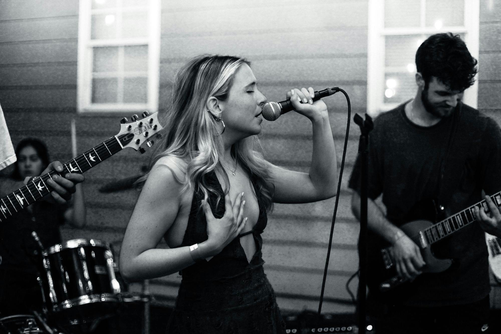 Student Musician Katie DeMartini, performs at a local house show produced by Local Mojo on April 25th, 2025.