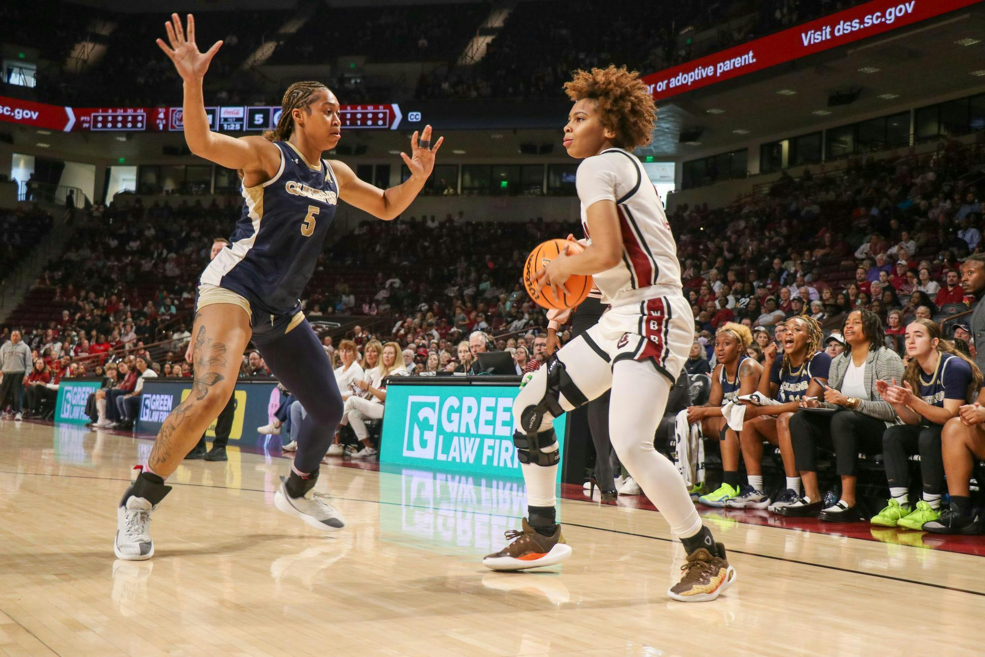 Sophomore guard Maddy McDaniel looks for a player to pass the ball to at Colonial Life Arena on Nov. 23, 2025. The Gamecocks had 26 assists against the Royals.&nbsp;&nbsp;