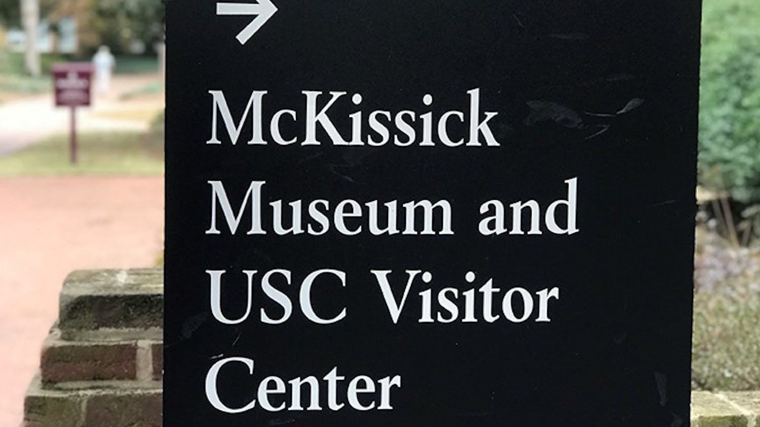 &nbsp;A university sign points toward the direction of the McKissick Museum, which is located just off the Horseshoe. The museum has been home to multiple exhibits in the past but is currently home to "Child's Play,” which was created by Leslie Yarborough.
