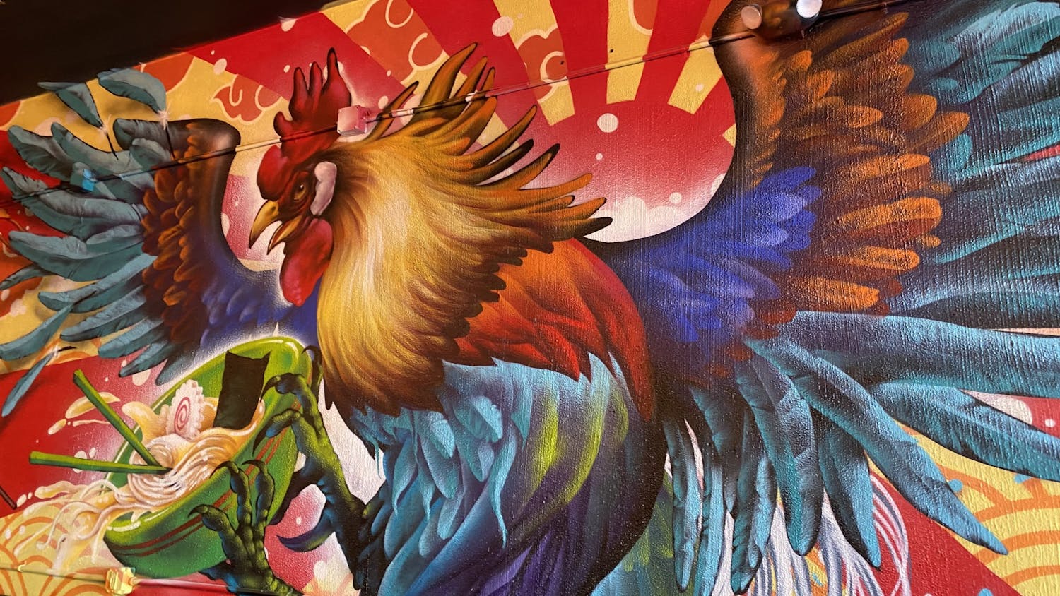 A mural within Boku Kitchen and Saloon, a new Pan-Asian restaurant in the Vista. The art and atmosphere within Boku are inspired by the graffiti art at the Wynwood Walls, an urban graffiti art museum in Miami, FL.