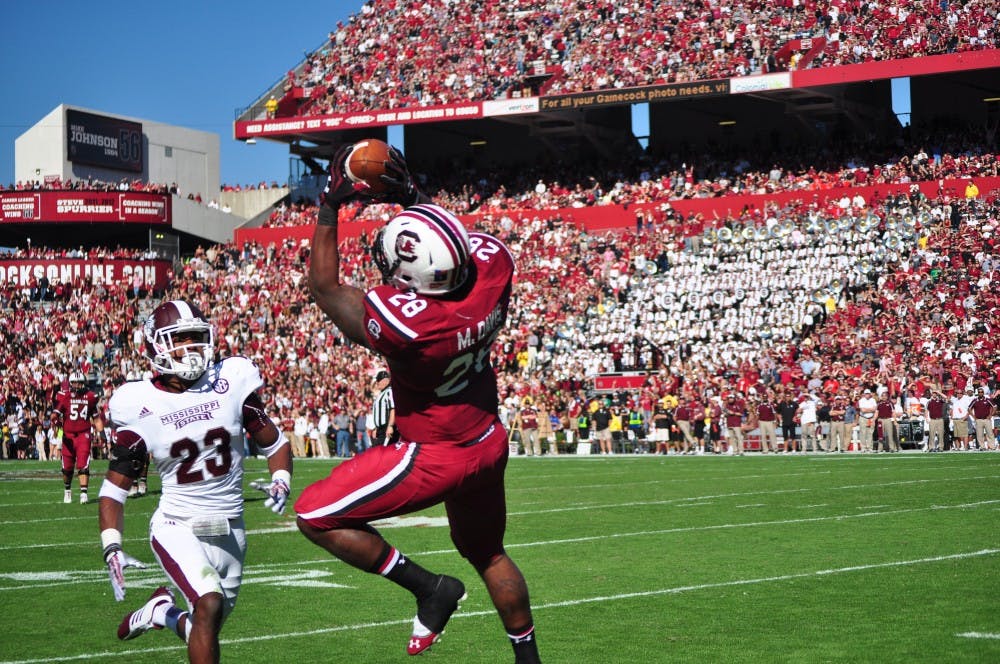 	Sophomore running back Mike Davis received just 15 carries Saturday, despite leading the conference in rushing.