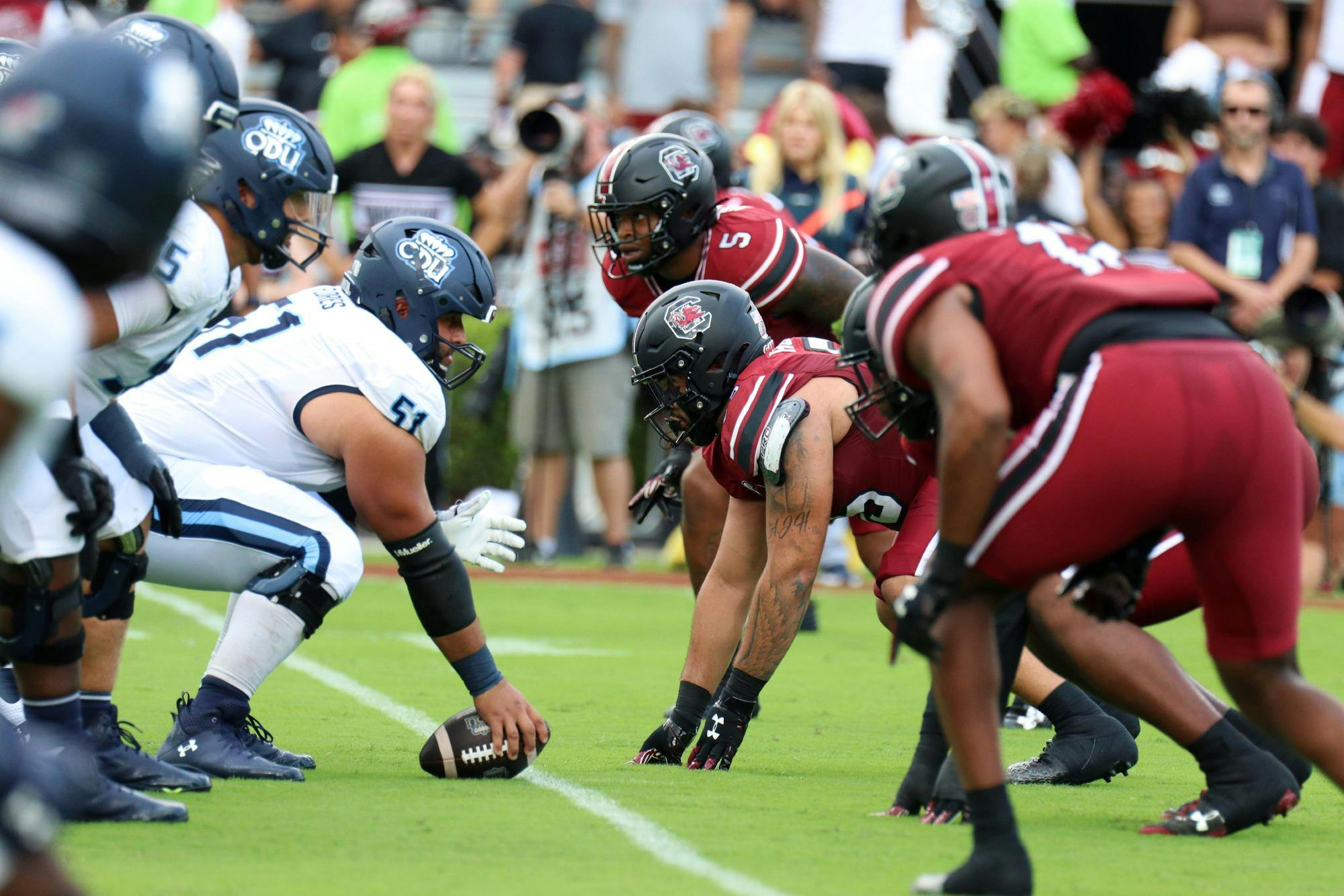 Fifth-year edge Kyle Kennard (center top) looks across the line of scrimmage toward Old Dominion's offense during South Carolina's season opener at Williams-Brice Stadium on Aug. 31, 2024. Kennard contributed five total tackles, 2.5 sacks, and two forced fumbles in the Gamecocks' 23-19 win over the Monarchs.