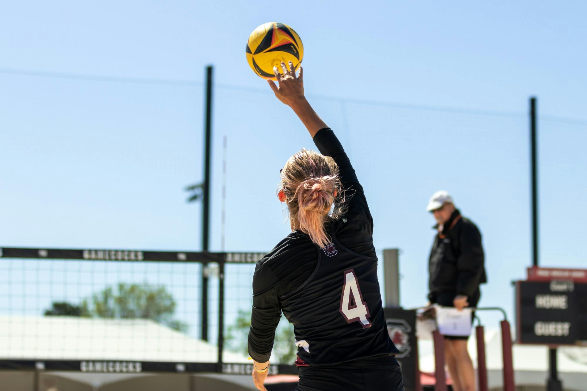 Junior Sophie Manson serves the ball at Wheeler Beach on April 2, 2022. South Carolina beat the Blazers 3-2. 