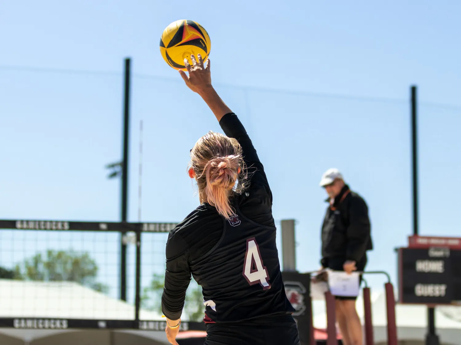Junior Sophie Manson serves the ball at Wheeler Beach on April 2, 2022. South Carolina beat the Blazers 3-2.