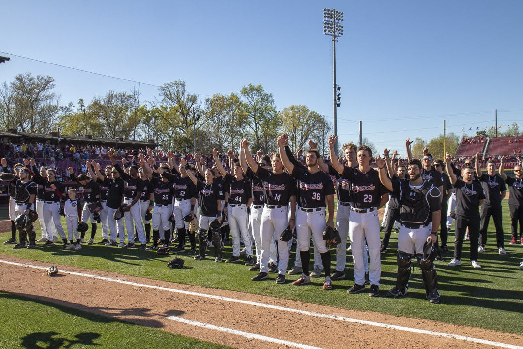 South Carolina players offer a toast during the playing of alma mater after their 7-1 win against Clemson on March 5, 2023. The Gamecocks beat the Tigers 2-1 in the series, putting it 11-1 in the season.