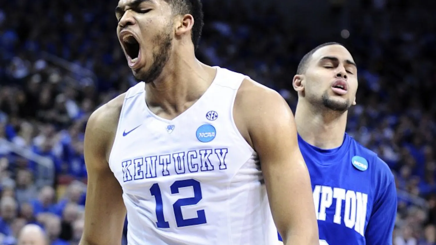 Kentucky's Karl-Anthony Towns (12) celebrates after scoring and being fouled by Hampton's Quinton Chievous in the second round of the NCAA Tournament at the KFC Yum! Center in Louisville, Ky., on Thursday, March 19, 2015. (Wally Skalij/Los Angeles Times/TNS)