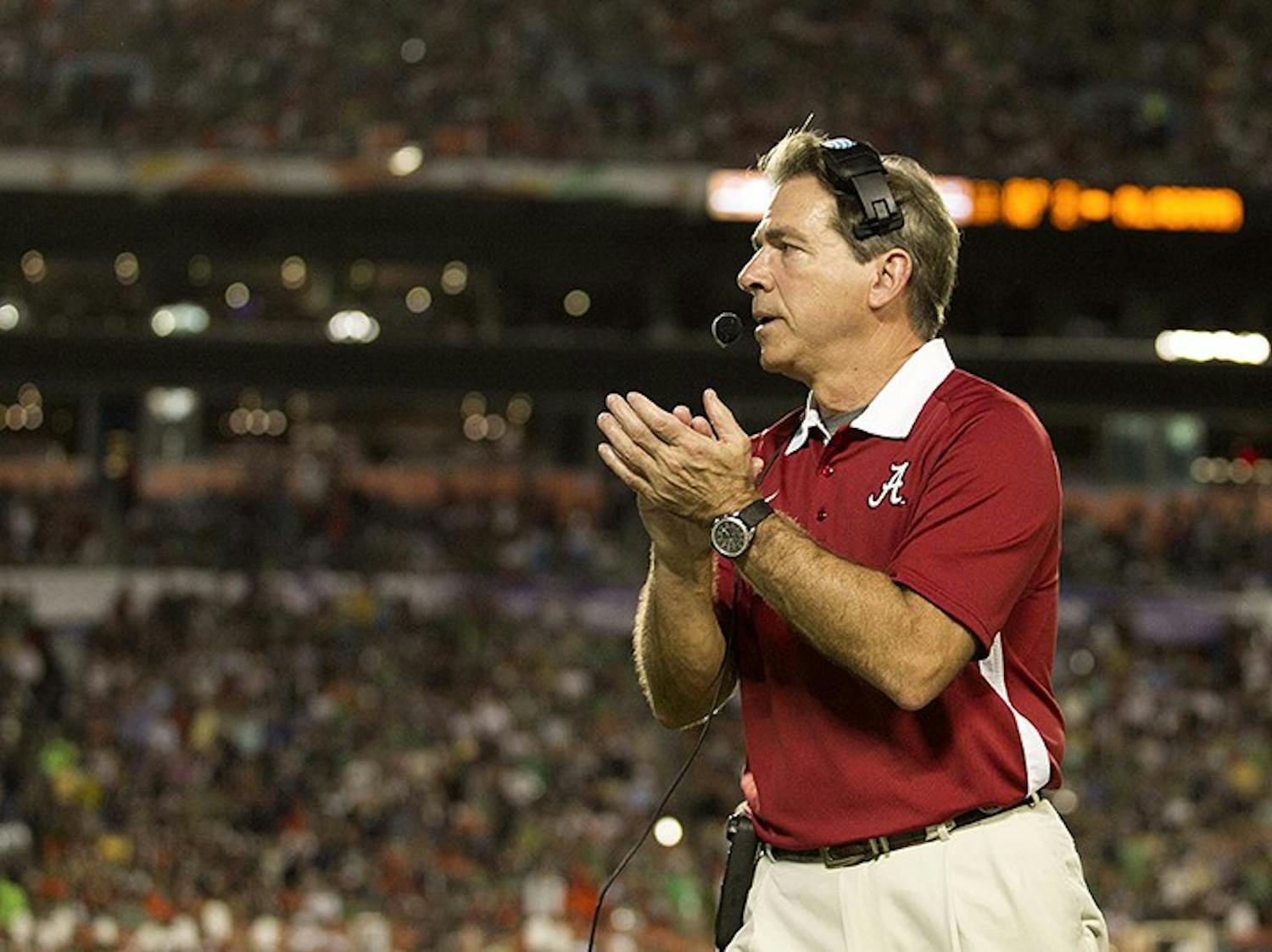 Alabama head coach Nick Saban applauds running back Eddie Lacy (42) after his second touchdown in the first half against Notre Dame in the BCS National Championship game at Sun Life Stadium on Monday, January 7, 2013, in Miami Gardens, Florida. (Allen Eyestone/Palm Beach Post/MCT)